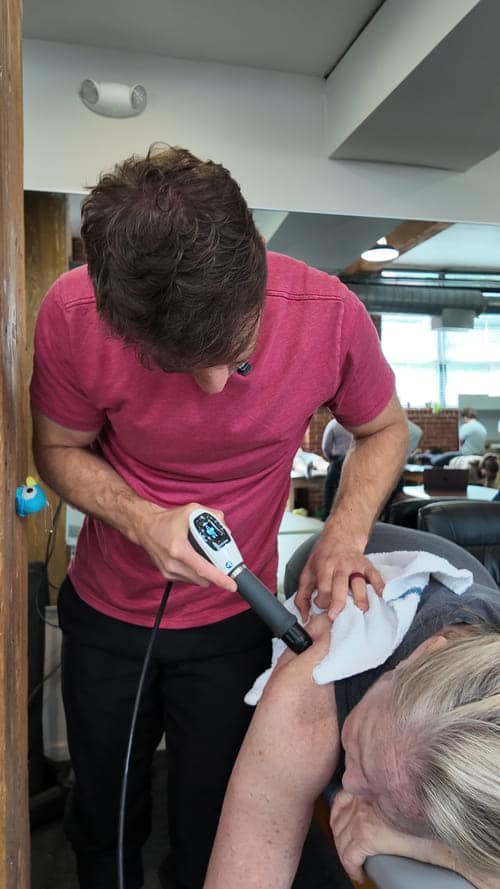 Shockwave therapy session in Philadelphia clinic.